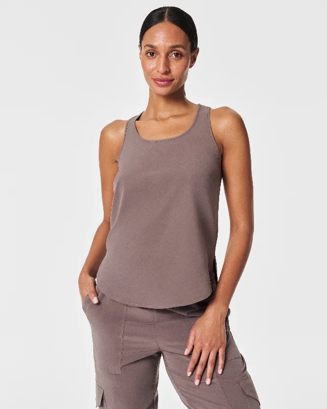 Fashion Forward Femininity SPANX® On the Move Curved Hem Tank